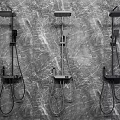 Three Modern Shower Systems Mounted On Grey Textured Wall Background 3d model