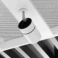Modern Recessed Downlights And Spotlights Installed In Perforated White And Slat Black Ceilings