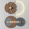 Flower Shaped And Circular Design Wall Decor With Gold Accents On Striped Wall