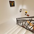 Staircase Area With White Walls Decorative Art Black Handrail Hanging Lights And Steps