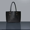 Elegant Black Leather Tote Bag With Embossed Badge And Blue Handles