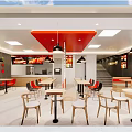 Modern Restaurant Interior With Red Black Chairs Tables Circular Colorful Wall Decor And Pendant Lights