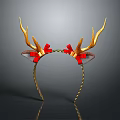 Decorative Wall Decor With Golden Antlers Red Bows And Twisted Band