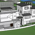 Modern Homestay Building Exterior With Multiple Units And Rooftop Structures
