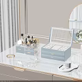 Light Blue Jewelry Box With Transparent Lid And Drawers For Gold Jewelry On Marble Countertop