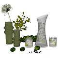 Fresh Green Limes on Black Plate with Vase Green Leaves and Pitcher with Ice