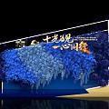Floral Art Installation With Blue And White Draped Flowers On Decorative Backdrop