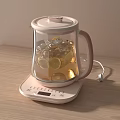 Electric Kettle with Transparent Body Ice Cubes Lemon Slices and Control Base