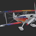 Vibrant Biplane with Colorful Striped Wings and Classic White Fuselage