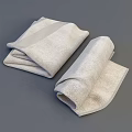 Soft Cotton Towels Neatly Folded and Rolled in Light Gray