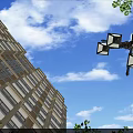 Modern High Rise Residential Building With Blue Sky White Clouds Green Trees And Street Lamps