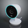 Nest White Security Camera With Blue Ring For Computer Desktop Monitoring Device