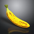 Fresh Ripe Banana With Yellow Peel And Brown Spots On Black Background