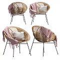 Rattan Outdoor Chair with Pink Blanket White Cushion and Black Metal Legs