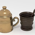 Two Decorative Cups Golden Lidded Mug With Handle And Dark Brown Cup With Stirring Stick