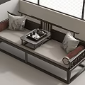 Modern Chinese Daybed With Decorative Pillows And Wooden Tea Table