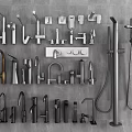 Various Bathroom Faucets And Shower Accessories In Different Styles Displayed On Gray Background