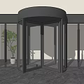 Modern Revolving Door With Glass Panels Black Frame And Marble Floor Interior