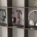 Modern Headphones In Black Red White With Stands On Wooden Shelf
