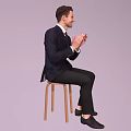 The Man In Dark Suit Sitting On Wooden Stool Clapping Hands Against Light Purple Background