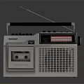 Vintage Cassette Radio With Silver Body Black Handle Control Panel And Display Screen