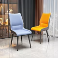 Modern Blue And Orange Dining Chairs With Upholstered Seats And Black Legs Design