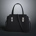 Sleek Black Handbag with Leather Handles Silver Metal Accents and Detachable Strap