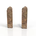 Ancient Stone Sculptures With Carved Inscriptions Two Standing Monuments