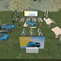 Outdoor Car Display Event On Grassland With Blue Cars Large Screen Tents And Tables