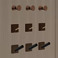 Wooden Hooks In Various Shapes Neatly Arranged On Light Wooden Wall