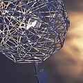 Modern Wire Spherical Table Lamp with Illuminating Light Projection on Background Wall 3d model