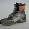 Black High Top Leather Shoes With Brown Ankle Accents And Thick Sole Design