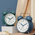 Vintage Green Blue Alarm Clocks With White Dials Black Numbers Bell Design On Stone Platform