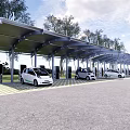 Modern Covered Parking Lot With Charging Stations White Cars And Trees Surrounded