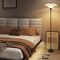 Double Bed with Gray Tufted Headboard Brown Pillows Cozy Blanket Floor Lamp and Matisse Print