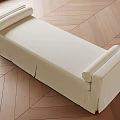 Beige Upholstered Sofa Bench With Cylindrical Armrests On Herringbone Wooden Floor