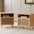 Two Modern Wooden Bedside Tables With Rattan Doors And Books On Top
