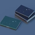 Dark Green and Navy Blue Books with Intricate Cover Patterns Stacked Together