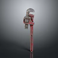 Red Worn Pipe Wrench Plumbing Tool On Gray Gradient Background