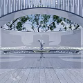 Contemporary Outdoor Sculpture In Arched Structure With Trees And Paved Ground Light Reflections