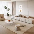 Modern Beige Sofa And White Coffee Table Set With Green Plants Rug And Wall Art
