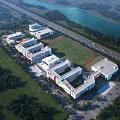 Aerial View of Modern School Building Complex with Sports Field Green Lawn and River