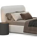 Modern Bedroom Bed With White Headboard Brown Bedding And Black Nightstand