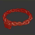 Elegant Golden Bracelet With Intertwined Chain Design And Decorative Gemstone