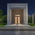Illuminated Entrance Gate Night View With Stone Design And Surrounding Greenery