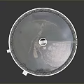 Circular Metal Lid With Shiny Surface Central Handle And Rim Design