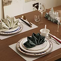 Wooden Dining Table Setting With Lotus Shaped Napkins Placemats Cutlery Glassware And Decorative Sculpture