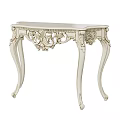 Golden Ornate Decorative Table With Intricate Carvings And Curved Legs Design