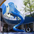 Outdoor Children's Play Area Featuring Blue Elephant Structure Spiral Slide And Green Trees