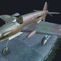 Camouflage Military Aircraft Model With Cross Insignia On Ground